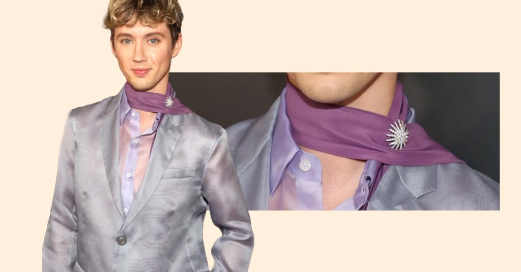 Troye Sivan In Starburst Diamond Brooch  - Top Jewelry Looks from Grammys 2025 Red Carpet